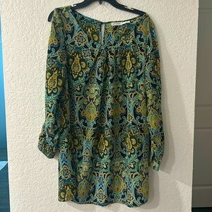 Blu Pepper dress with fantastic colors. Slits in sleeves for added styling.